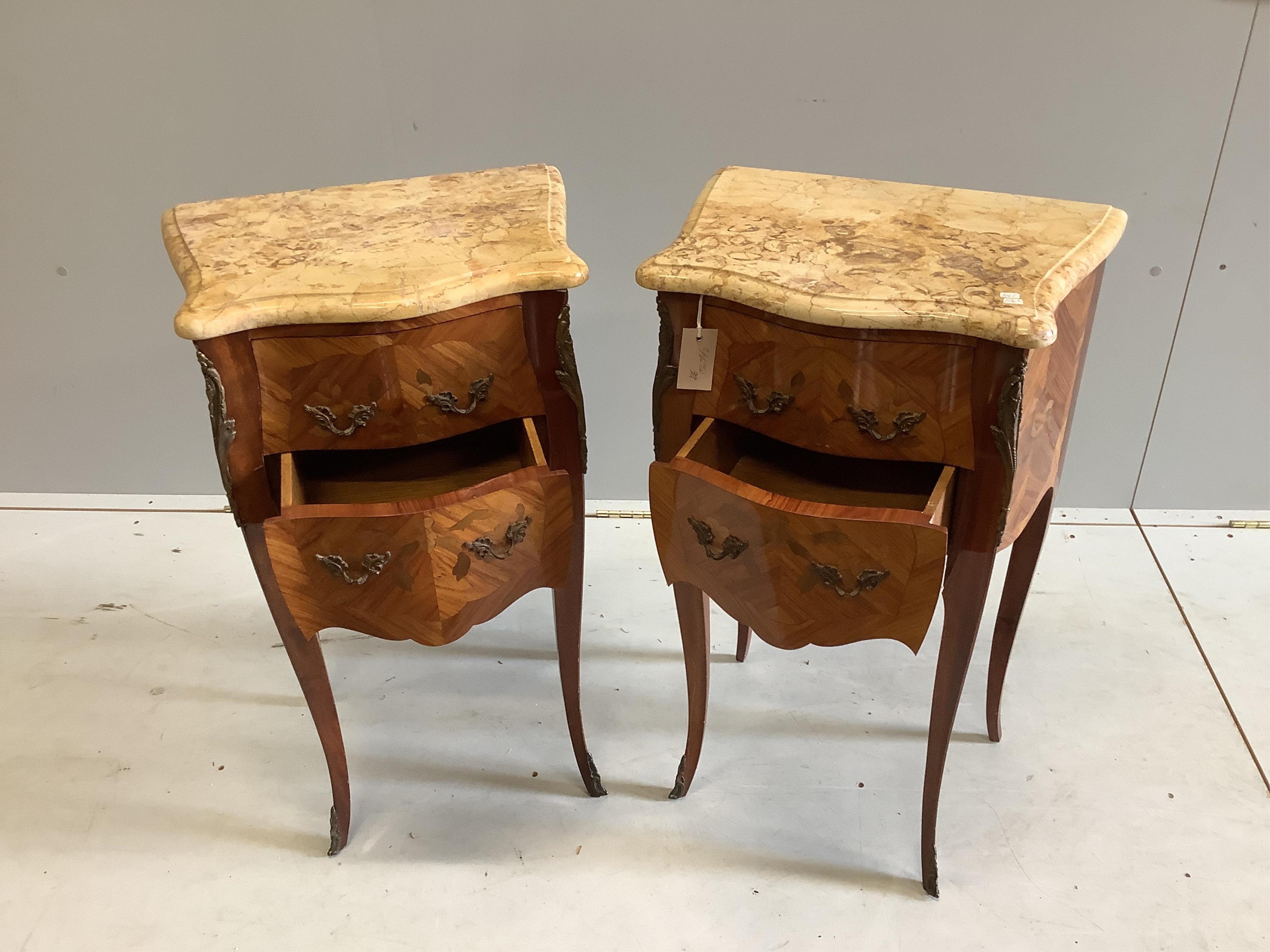 A pair of Louis XVI style marquetry inlaid gilt metal mounted kingwood marble top bedside cabinets, width 45cm, depth 32cm, height 75cm. Condition - good